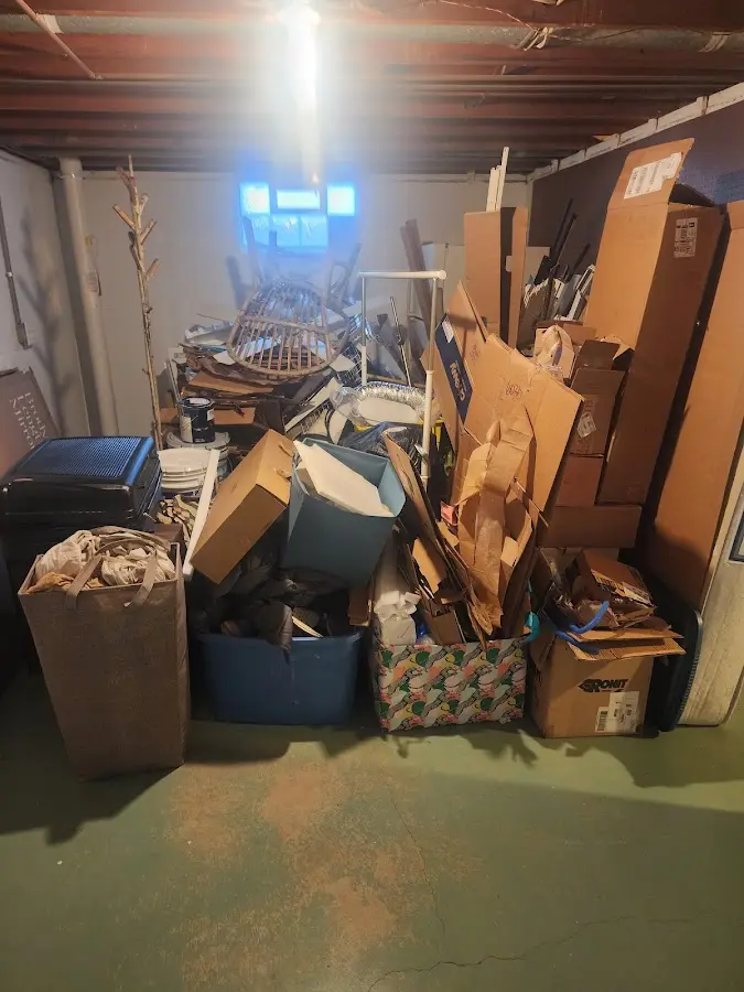 Roll-off dumpster container at job site for 4 Yard Dumpster Rental in Alma